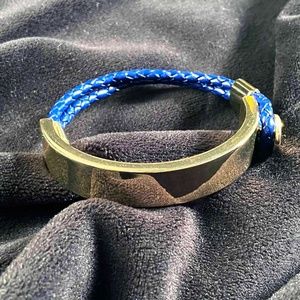 Gold bar and navy leather bracelet